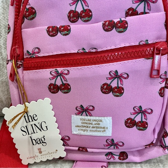 ✨💎NWT💎✨ Simply  Southern Pink Cherry Print Crossbody Sling Bag with Red Accents - Picture 9 of 9
